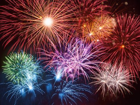 Colorful firework display in night sky.