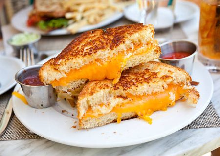 Grilled cheese sandwich at restaurant. (SEE LIGHTBOXES BELOW for more lunch, dinner, meals & food backgrounds...)